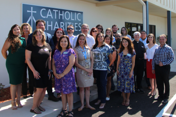 Allison (second from right) at the opening ceremony of the CCCTX Killeen office in 2023.